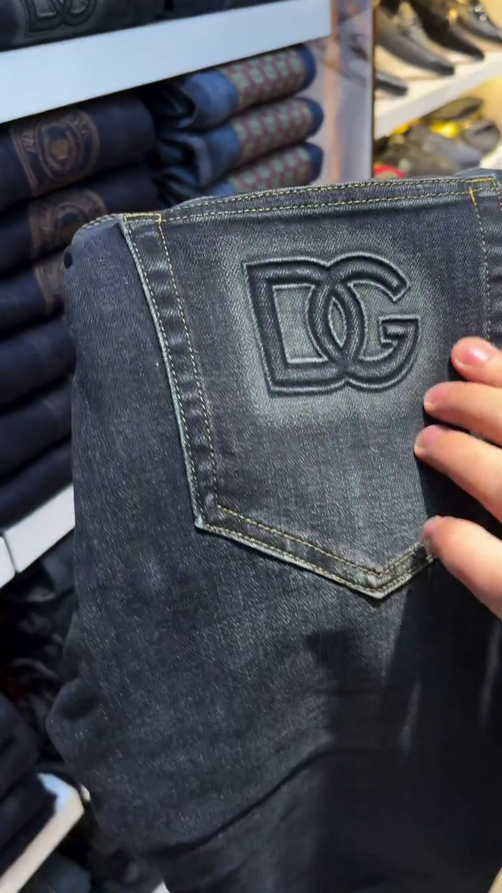 Dolce & Gabbana Men’s Blue Rugged Jeans – Signature Metal Logo Style & Premium Italian Craftsmanship