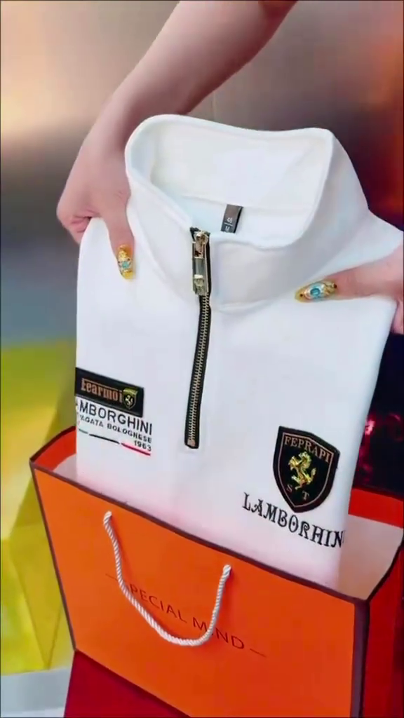 Drive in Style: White Lamborghini Quarter-Zip Sweatshirt with Bold Orange Accents”